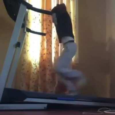 Trying to take shirt off while on a treadmill