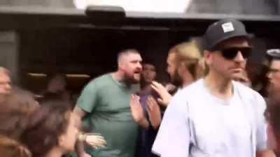 Vegan protestors vs hungry man