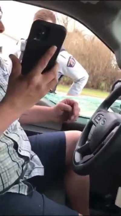 Alberta man intentionally strikes officer with his truck, drives away, and gets arrested