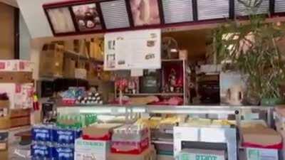 Maskless business owner loses his cool on customer.