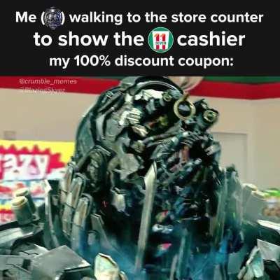 Me showing the cashier my 100% discount coupon: