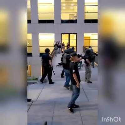 Downtown Salt Lake City May 30th 2020. Unarmed civilian face down prone on the ground GETS SHOT IN THE SPINE AT POINT BLANK WITH BEAN BAG GUN. Where is this in your training manual?