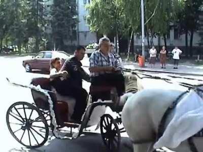 Riding on a horse-drawn carriage on wedding day wasn't the best idea