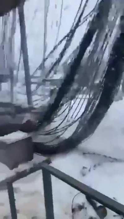 WCGW Clearing snow from the roof