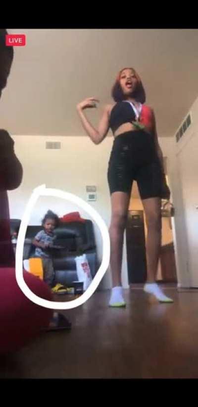 Baby Picks up gun while girl is on IG live