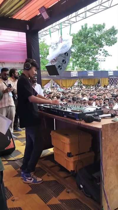 DJ in front of uninterested crown