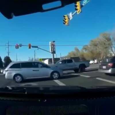 Speeding through a red light and causing a pile up
