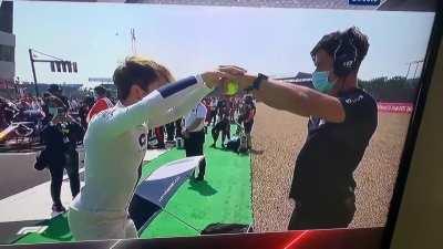 Pierre Gasly testing his reaction time before the race