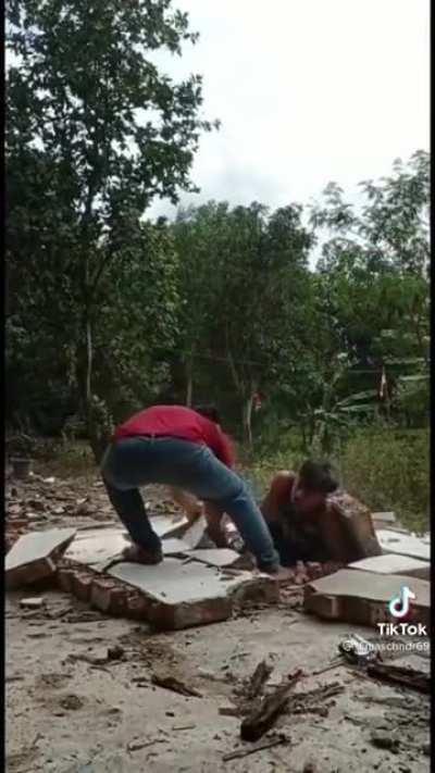 Practicing martial arts, but the wall fights back.