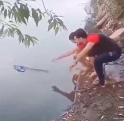 A dad helping his son