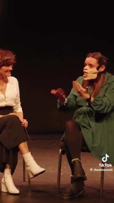 Ventriloquist Nina Conti does a human ventriloquism bit with two sisters from the audience.