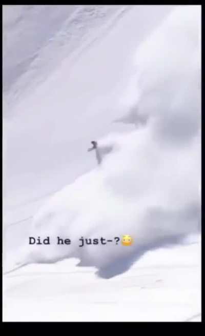 Guy outrunning an avalanche does a backflip