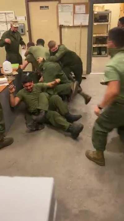 Just guys being dudes, wrestling and stuff