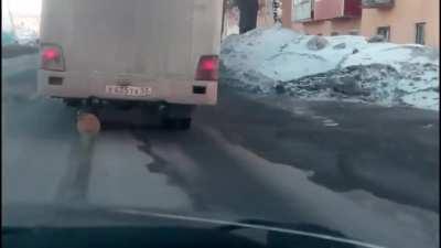 A Wood Log Where A Tire Should Be In Prokopyevsk, Russia