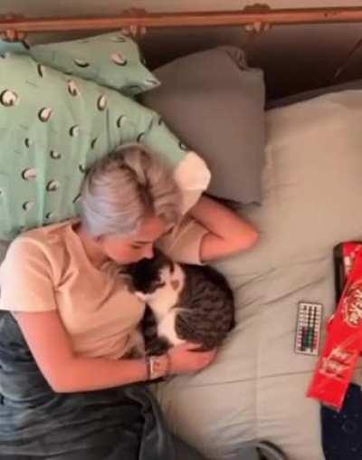 A timelaps of a lady and her cat spending lazy day together