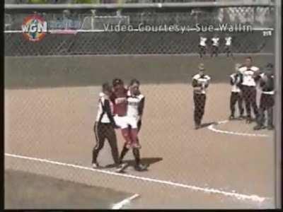 College senior hits her first-ever home run but tears her ACL rounding 1st base. Rules don't allow her teammates to help her without being called out, so the opposing team helps her around the bases.