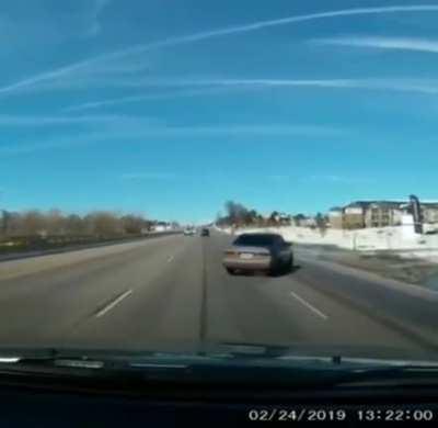 This idiot passing at high speed through a puddle