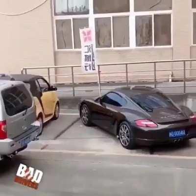 Luxury life habit to just park where ever you want and this guy decides to help him out
