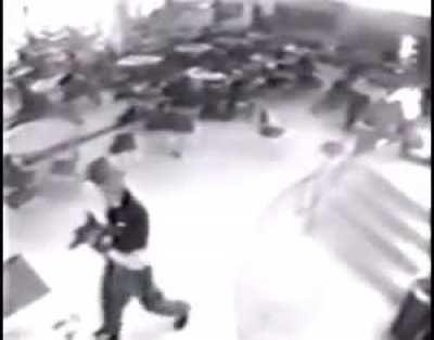 What is Dylan holding in his right hand here?