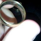 Bottom ring is mine, top ring was found today. I see writings are different. Could anyone please say what is right and what does wrong say?
