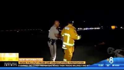 Cop arrests fire fighter in the middle of tending to a wounded civilian because fire truck was 1 mm over the line.