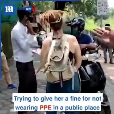 Ignorant Backpacker Coughs On Police In India