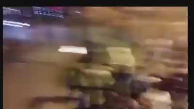 Man gets jumped by a bunch of rioters after telling them to stop breaking windows of a business. While getting beaten by the mob in fear of his life he takes out a gun and fires a shot in the air that disperses the mob and has them running in every direct