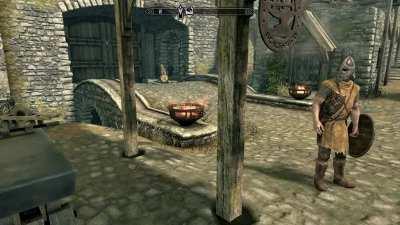 Whiterun guard works on his smithing