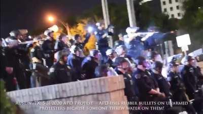 APD gets water splashed on them and immediately fires into the crowd.