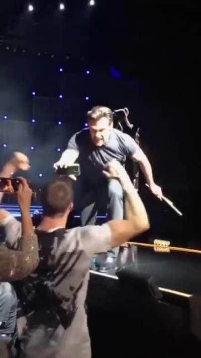 Hugh Jackman getting a fan fired up!