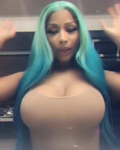 Nicki Minaj Rubs Her Massive Boobs
