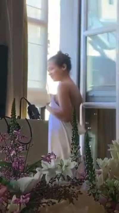 Taylor Russell [Lost In Space] flashing at her hotel window in Paris
