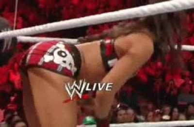 AJ Lee enter the Ring in her old red plaid gear