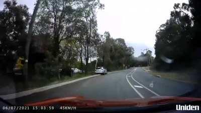 Perth, Australia. Car runs off the road into trees mid bend.
