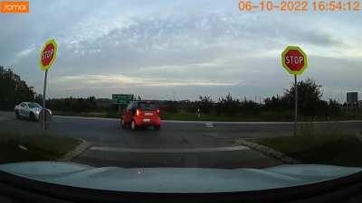 Woman in Smart claimed that the Camaro came too fast...