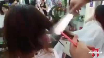 Would you ever get your hair cut by this guy?