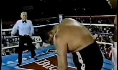 Big George knocking the mouth guard and soul out of a man.