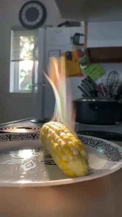 The camera captured the light reflecting off the water droplets of the steam at the right angle to make Magical Corn 🌽