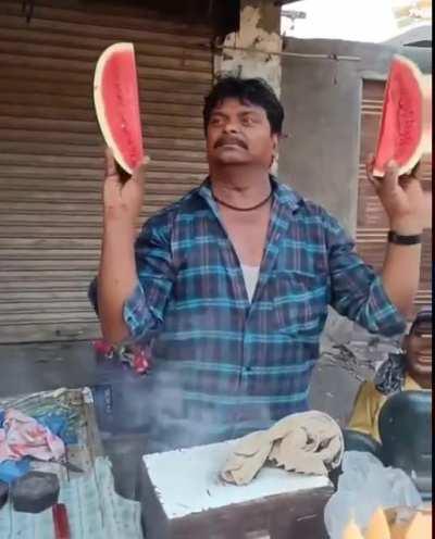 Not sure if this guy really loves or really hates selling fruit.