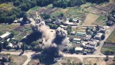 Ukrainian scouts from the 92nd brigade, using a shark uav, discovered a Russian logistics base and coordinated with artillery units to destroy the base. Location unknown, but more than likely in Kursk. (Music from source)