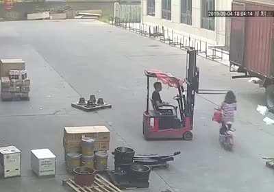 Backpack landing perfectly on forklift arm