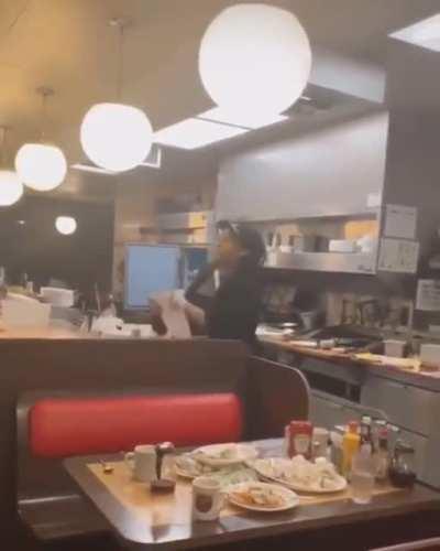 Waffle House customers and staff engaged in an altercation