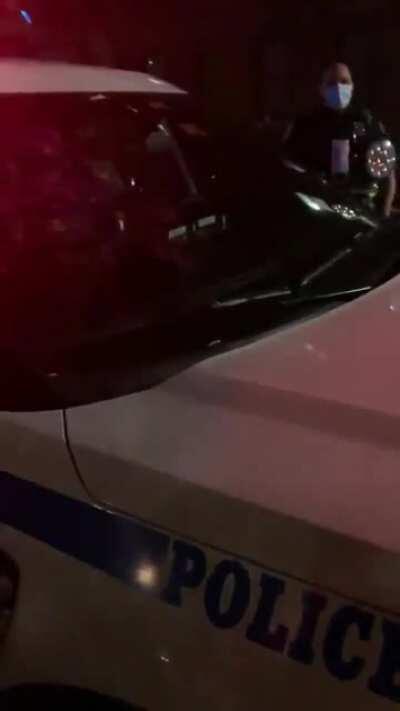 A commie gets triggered after a cop says 