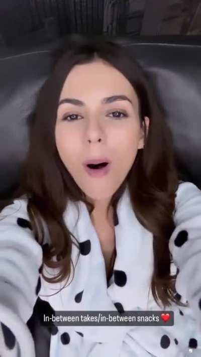 Victoria in-between takes snacks