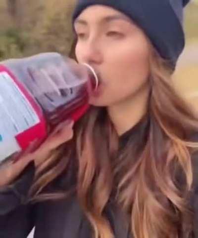 Recording and drinking juice instead of paying attention while skate boarding