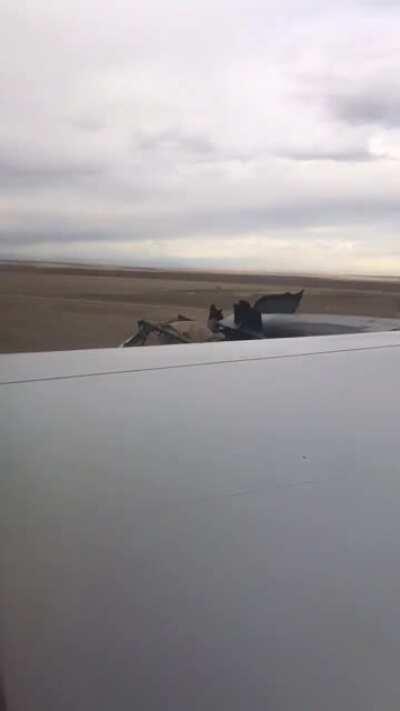 Video of UA328 landing after an uncontained engine failure a few hours ago