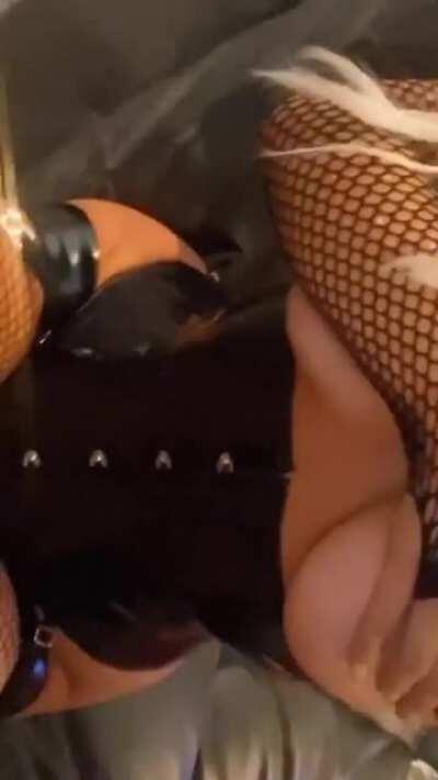 Getting her makeup on while being braless