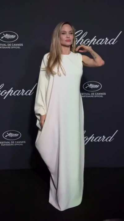 Angelina attends the photocall for the Chopard Trophy at the 78th Annual Cannes Film Festival at Carlton Beach in Cannes - IG May 2025