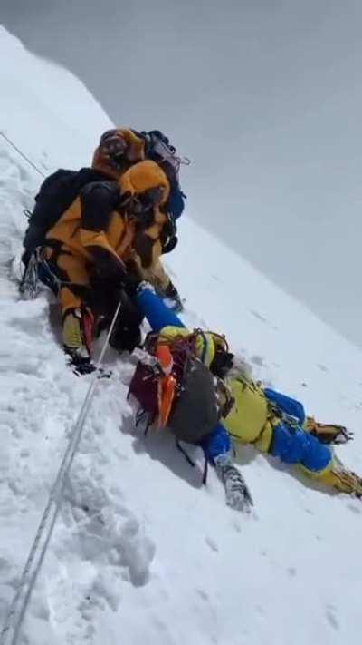 On mount everest, traffic congestion leads to climbers being at more risk of dying. Team-mates can only see them dying.
