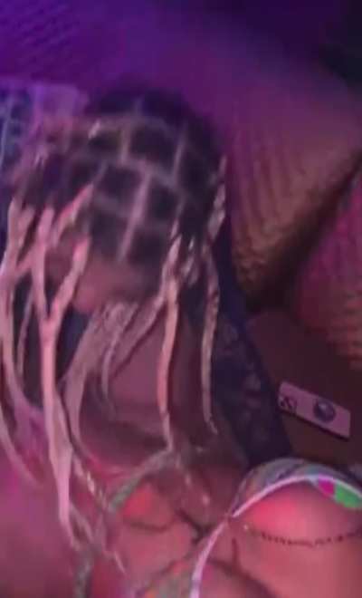 Giving a rapper top in the club.